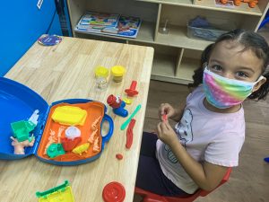 Preschool girl wearing mask